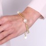 BRACCIALE IN METALLO CON PERLE