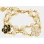 BRACCIALE IN METALLO SFERE BIANCHE FIORI
